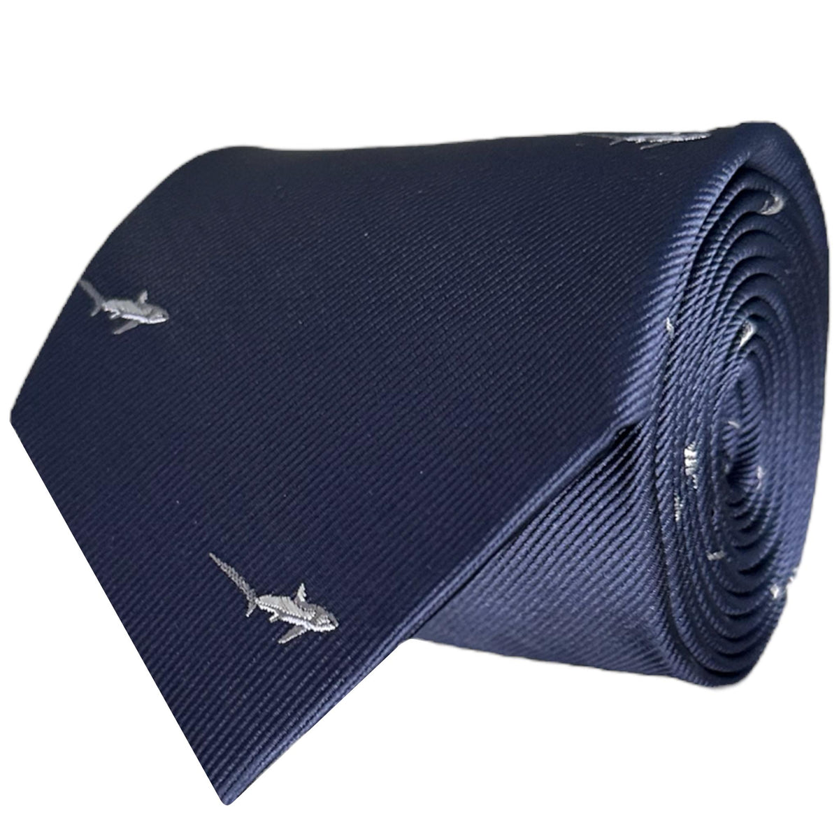 A navy blue necktie with a pattern of small grey sharks swimming in a subtle direction.