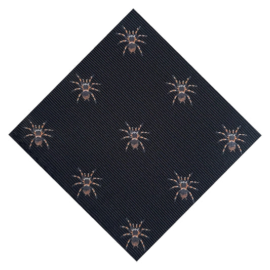 A black pocket square with tarantula embroidery.